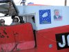 Kutry i łodzie Pielgrzymki wpływają do portu.